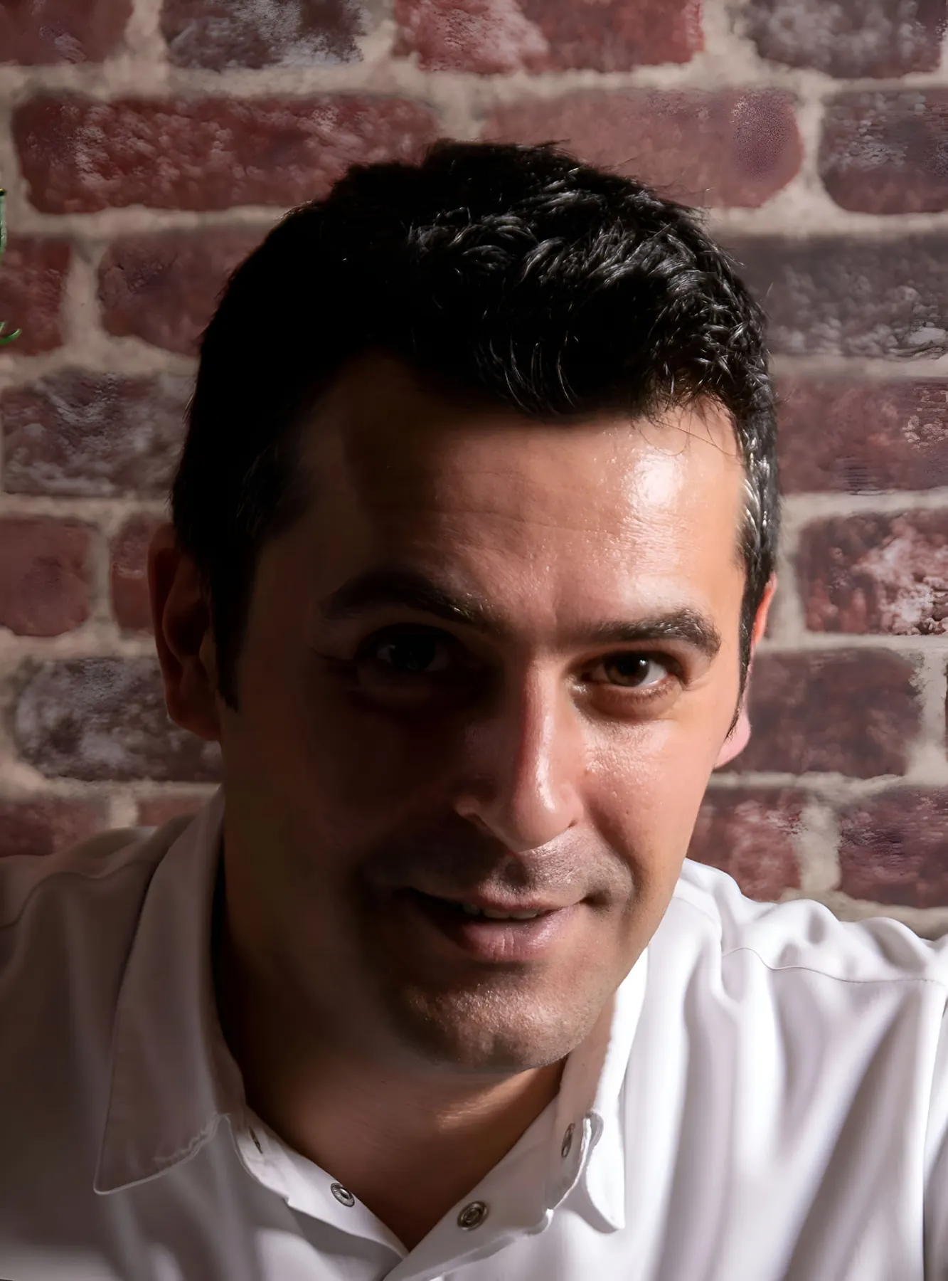 Chef Panagiotis Polychronis plating a dessert